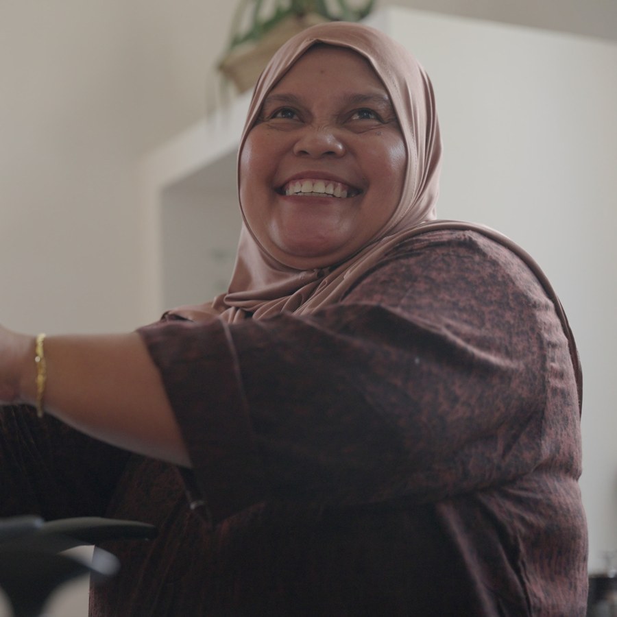 Smiling Muna cooking in a villa kitchen, private chef in Canggu, Pererenan and Seminyak, Bali